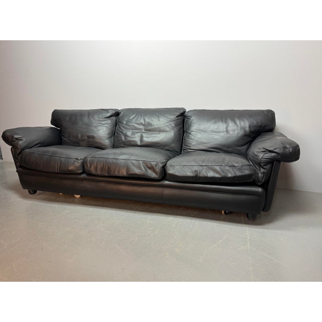 Exceptional three-seat sofa model “Poppy 3,” designed by Tito Agnoli in 1974 and produced by Poltrona Frau. Upholstered in...