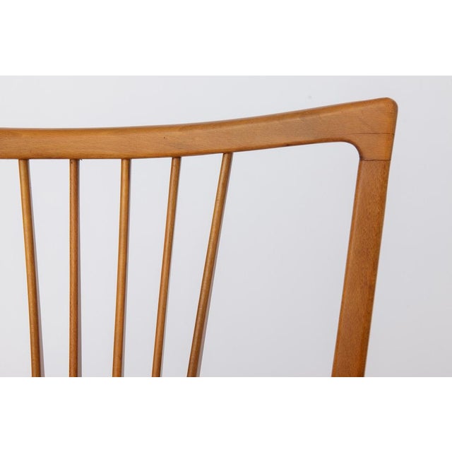 One of two vintage armchairs dating from the 1950s, most likely of German origin. The manufacturer is unknown. The price...
