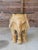 A true showstopper. This vintage monumental hand-carved elephant table base is pure sculptural drama—bold, whimsical, and...