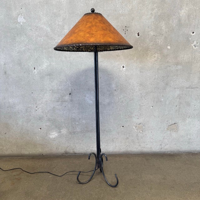 vintage spanish style wrought iron lamp with leatherette shade in style of Maitland-Smith adds warmth, charm, and depth to...