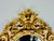 Florentine Gold Oval Mirror, in Very Good conditions. Designed before 1890