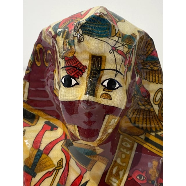 Marvelously inventive figurine - a sculpture material covered with a Hermes style fabric and embelished even further with...