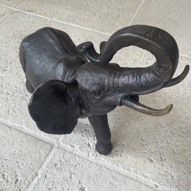 Vintage large elephant bronze sculpture tusks cover brass. Come from France.