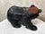 Solid wood bear sculpture, crafted according to the tradition of the Ainu, the indigenous people of Hokkaido Island in...