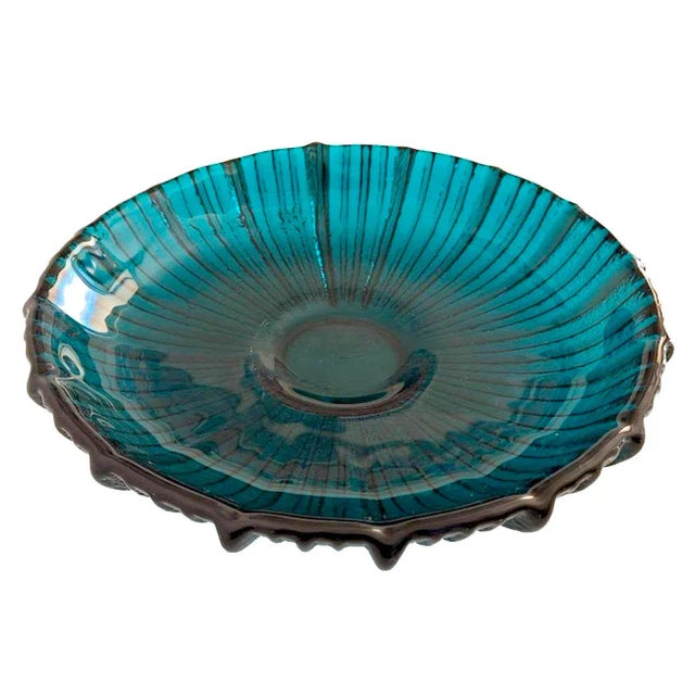 Offered is a heavy textured art glass bowl designed for Blenko Glass by Joel Myers in 1964. The model is 641L, and the...