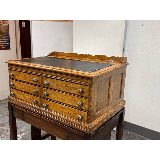 Design Plus Gallery presents an Antique Oak Spool Cabinet. This J. & P. Coats Oak Spool Cabinet is a beautifully preserved...