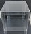 The MCM Hollywood Regency Clear Lucite Acrylic Two-Tier Square Side Table is a vintage piece of furniture that exudes...