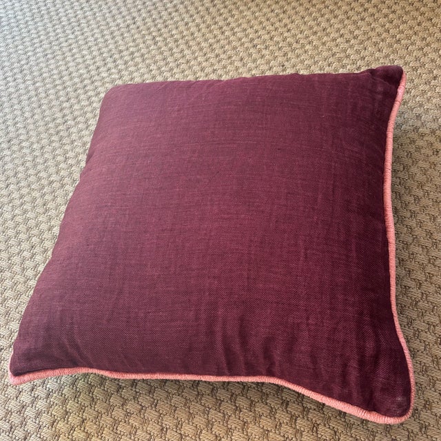 Pretty contemporary linen throw pillow in eggplant purple with a pink trim and zippered opening. Most items found at Pub &...