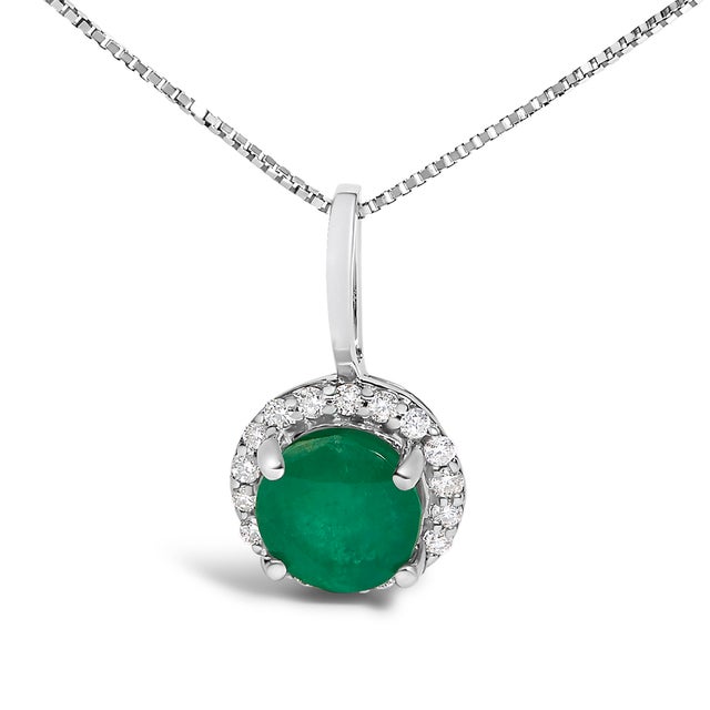 Adorn your neckline with the exquisite allure of this 10K white gold pendant necklace, where the warmth of the metal...