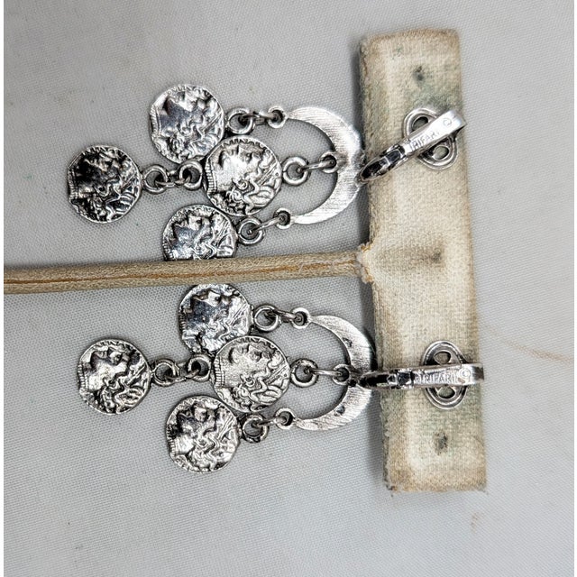 Metal Vintage 1970s Signed Crown Trifari Rhodium Plated Alexander the Great "Coin" Chandelier Clip Earrings-2 Pieces For Sale - Image 7 of 8