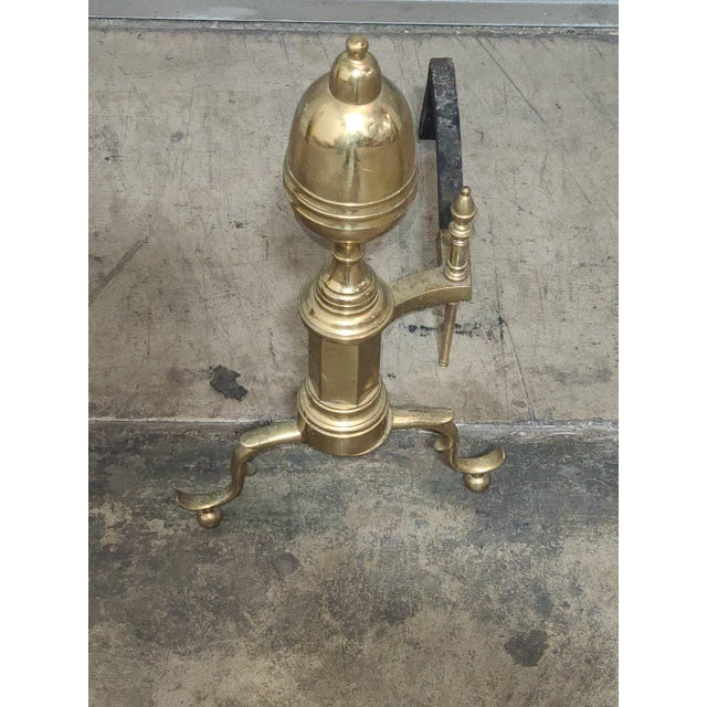 Store Item: Pair of Virginia Metalcrafters Brass Fireplace Andirons Description: Binnery Style andirons crafted from a...