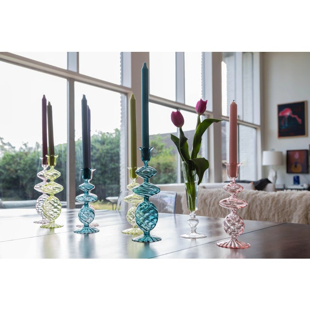 These charming candlesticks are mouth-blown using borosilicate glass. They are wonderful scattered down a dining table or...