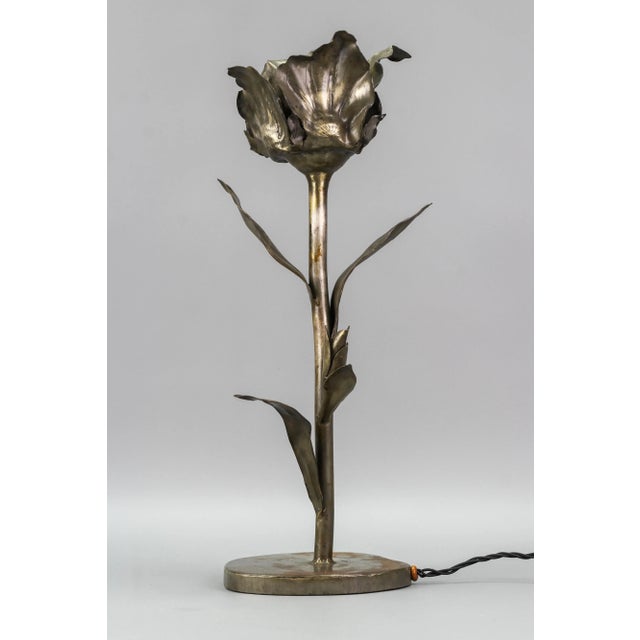 Unique and impressive hand-made Mid-Century Modern metal table lamp in the shape of a large flower with bud and leaves;...