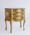Vintage Florentine chest of drawers with unique gold and white painted details. The cabinet has three drawers with brass...