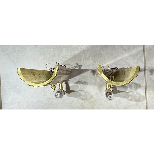 One of the kind striking pair of custom-crafted wall sconces by the artist Joseph Malekan. Masterfully reimagined from...