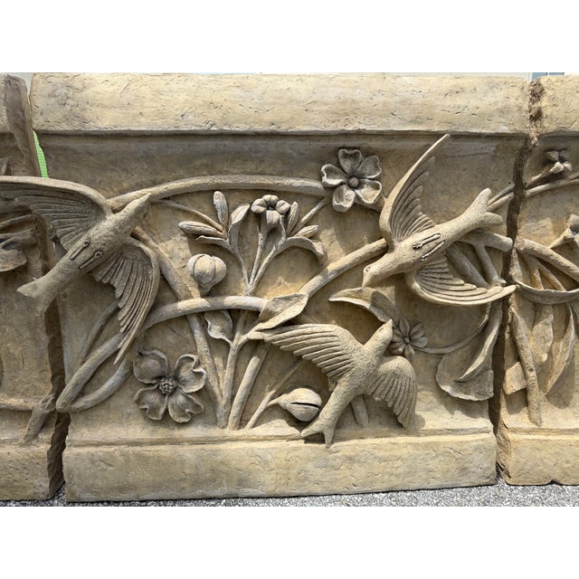 Decorative Panel divided into 3 parts Concrete wall Frieze . Striking high-relief craving of birds in flight among...