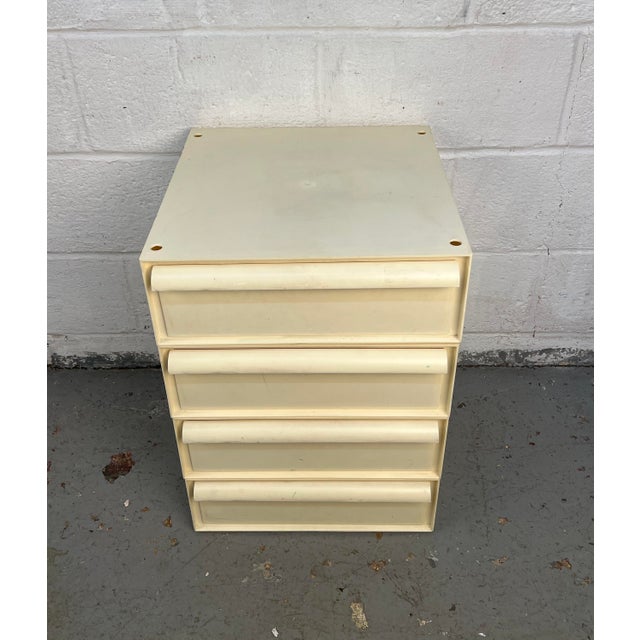 A mid-century modern four-tier stackable tower cabinet designed by Simon Fussell and manufactured by Kartell. Made from...