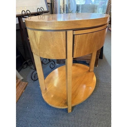 1980s Charles Pfister for Baker Furniture Oval Burl Veneer 1 Drawer Nightstand. Light wear associated with age and gentle...
