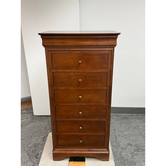Design Plus Gallery presents the Louis Philippe Lingerie Chest by Shermag. This tall chest showcases Shermag’s traditional...