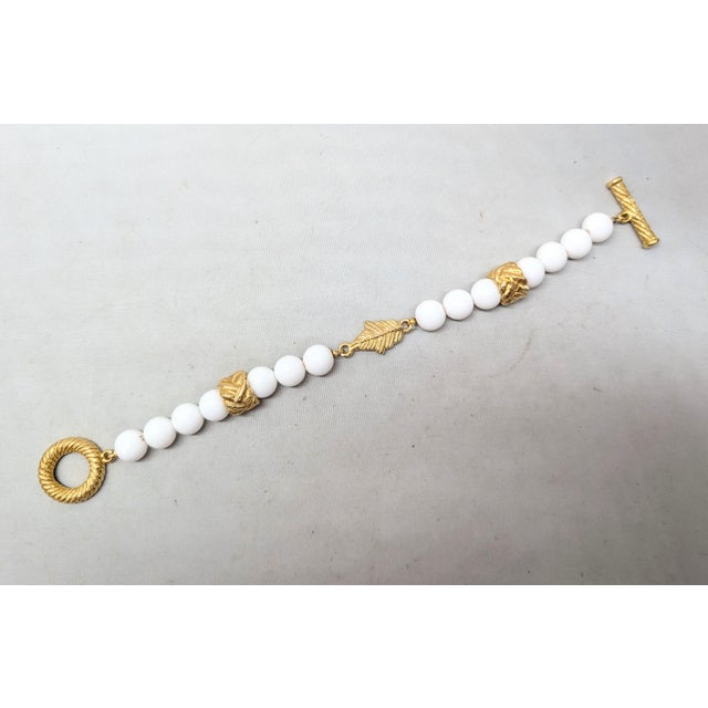 Vintage 1980s Signed Givenchy Goldtone & White Resin Leaf Toggle Bracelet For Sale In Philadelphia - Image 6 of 8