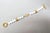 Vintage 1980s Signed Givenchy Goldtone & White Resin Leaf Toggle Bracelet For Sale In Philadelphia - Image 6 of 8