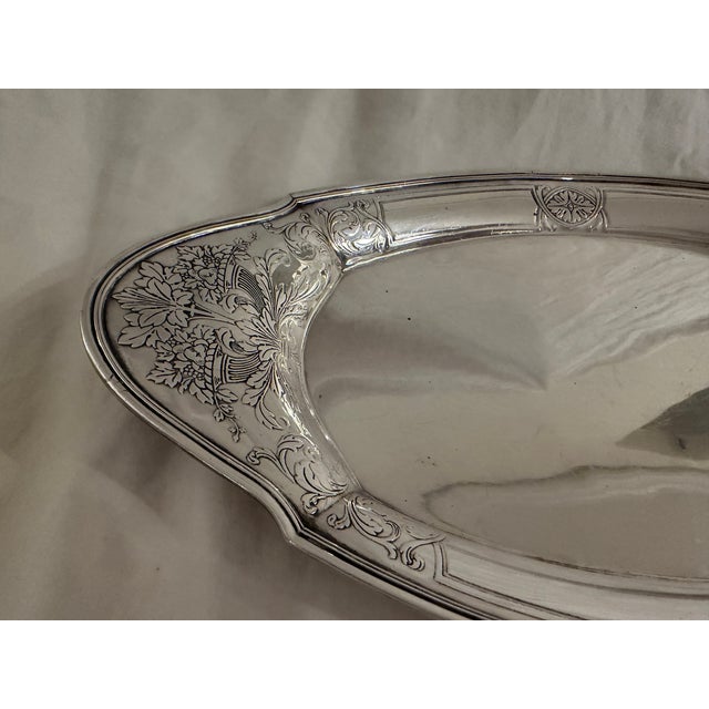 Antique Tiffany & Co. sterling silver oval dish featuring an elaborate, ornate floral and nature-inspired design etched...