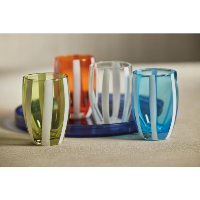 This lovely stemless glass is a stunning work of art. The shape is a classic tapered cylindrical shape, but the design of...