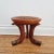 Three legged tribal stool from Southern Ethiopia. Light reddish wood the legs are partly covered with brass. Early 1900s /...