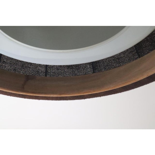 This high-quality pendant lamp combines many typical materials of its era, making it a rare find on the international...
