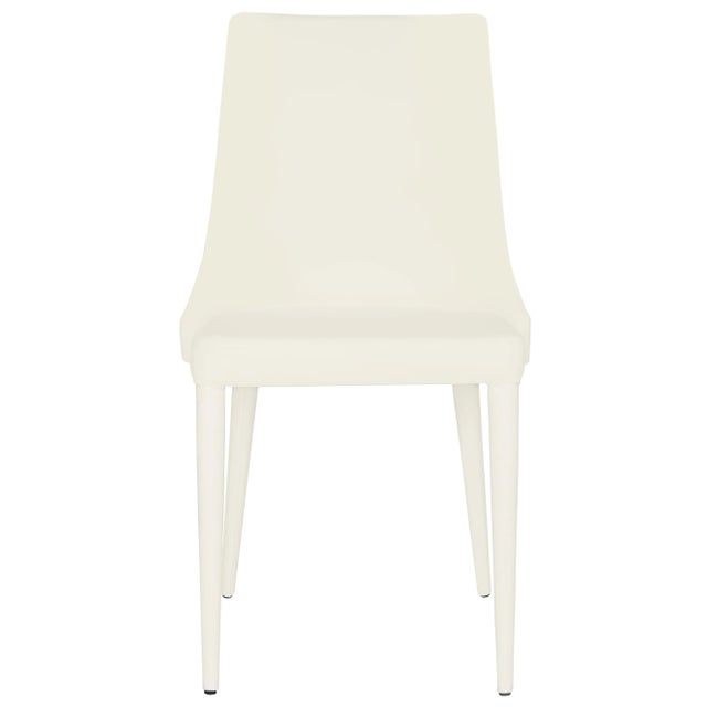 The white chair becomes a ideal dining companion when it’s crafted of easy-care PU leather and a sturdy iron frame. This...