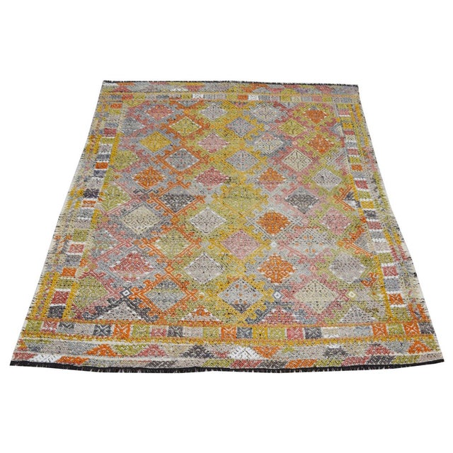 Flatweaved with care using traditional rug-making techniques, this wool rug blends timeless craftsmanship with a modern...