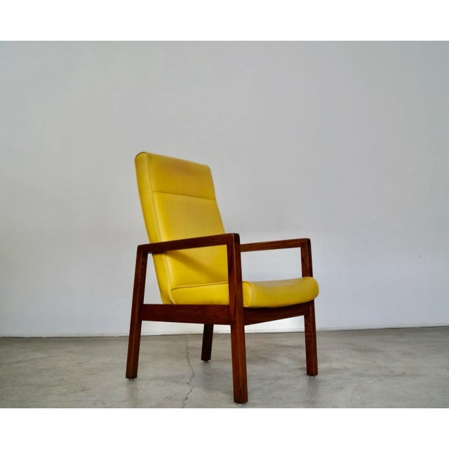Vintage Mid-century Modern lounge chair for sale. From the late 1960's, and really well made. It has a solid oak frame...