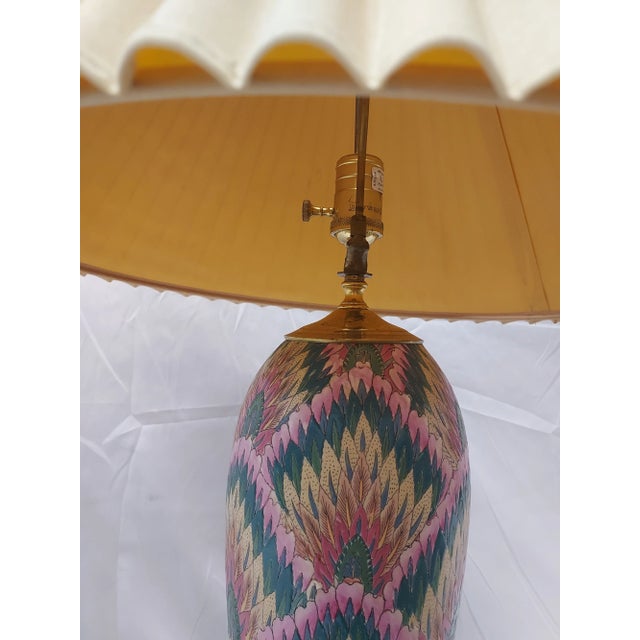 MCM Heyward House table lamp with beige pleated shade, rosewood base and brass cap and harp. Missing finial. Shade...