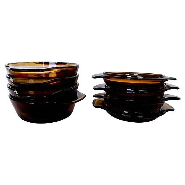 Vintage Set of four single serving Fire-King amber bowls. Dimensions: bowls, 6.25"Dia x 2"H; lid, 6.5"Dia x 1"H. Excellent!