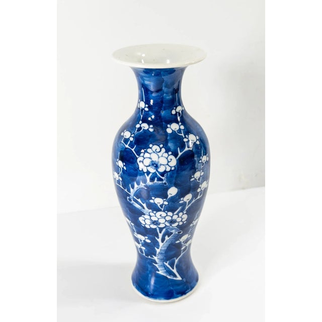 We are selling this decorative Chinese underglaze blue and white garniture vase with simple prunus decoration. This vase...