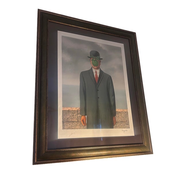 Limited and numbered lithograph reproduction of The Son of Man (Le fils de l'homme) from 1997 of the iconic 1964...