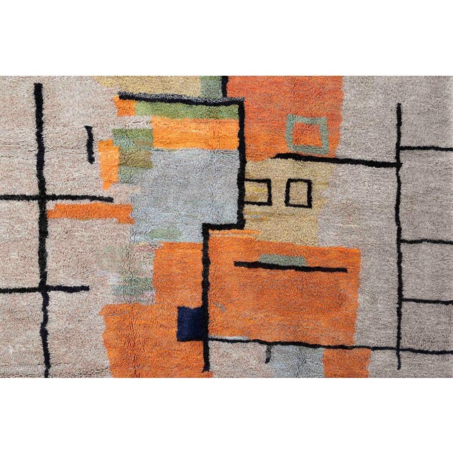 Energetic hand-knotted wool rug with a playful, abstract design in muted Simply Taupe, Ivory, Sunshine, Orange Tiger, Rose...