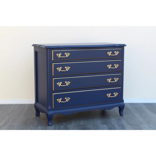 Vintage French style commode of four drawers This lovely chest of drawers is solid built, and it has been refinished in...