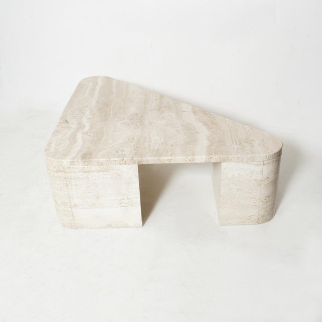 Exclusive triangular travertine table with rounded corners, and 3 large solid triangular feets designed by an architect...