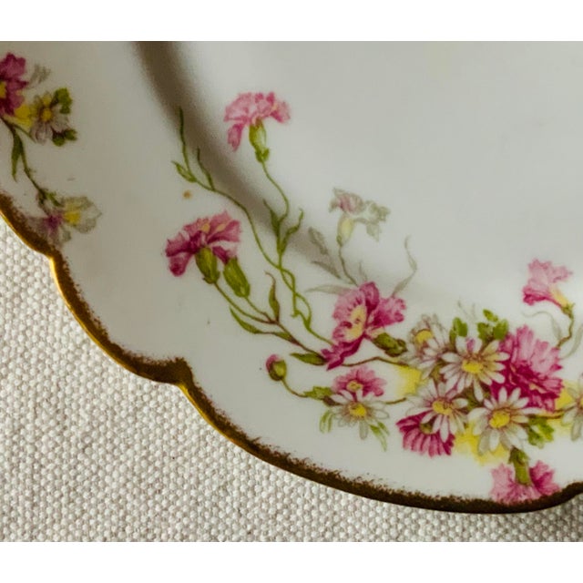 ….An exquisite antique soufflé dish with matching underplate, crafted by the prestigious Bawo & Dotter Elite Works in...