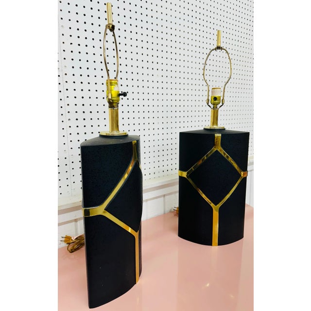 This listing is for a pair of Post Modern Clover Lamp Company Black & Brass Table Lamps. Featuring a cylinder shaped...