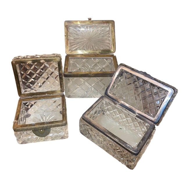 A refined and elegant set of three late 19th century Baccarat cut crystal boxes, each finely crafted with intricate...