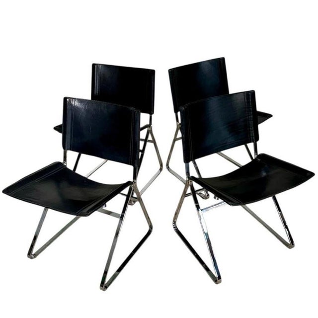 Italian Leather and stainless steel dining chairs, Italy 1970s. Original leather, original condition. No label. Measure...