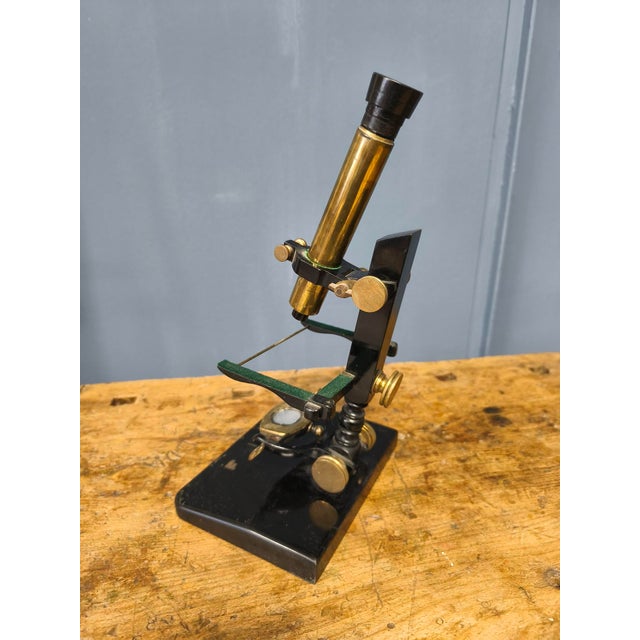 This microscope was made in the 1850s. I don't think it was made in a major factory, more like a small workshop. What's...