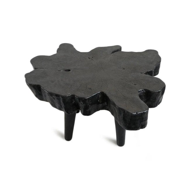Organic live edge lychee wood stump coffee table. Stunning natural shape with rich ebony stained finish. A focal point in...