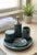 Designed and hand-carved by Artefactia from solid Udaipur Green Marble, this five-piece bath accessory set brings a...