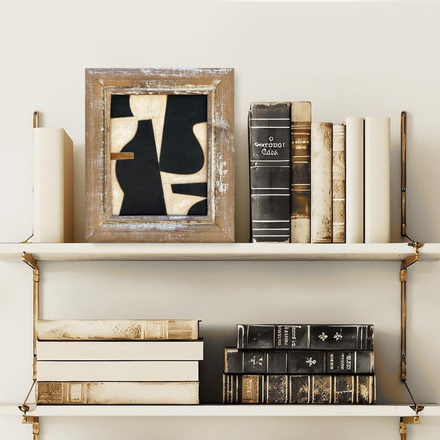 This is a simple bold paper collage in black and ivory set in a vintage salvaged wood frame. The collage is made from...