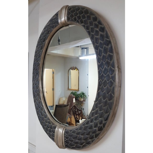 Fine Art large frame wall mirror with snake skin design. This is a showroom floor sample. The color is a blue/gray. This...