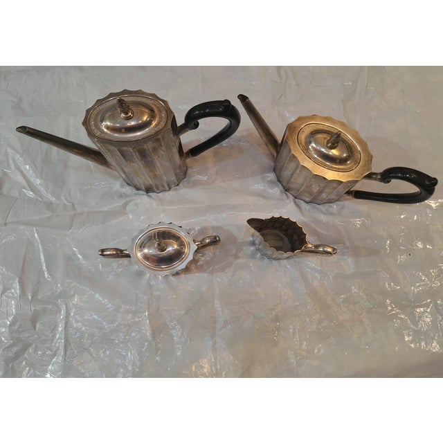 Elegant antique silver-plated tea and coffee service dating to the late Victorian / early Edwardian period, circa...