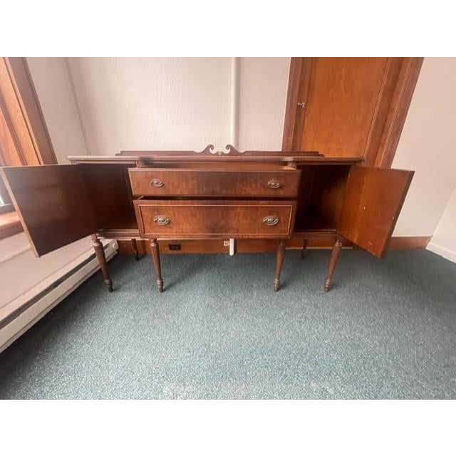 Elevate your dining space with this exceptionally elegant 1930s Federal Revival sideboard buffet. Masterfully constructed...